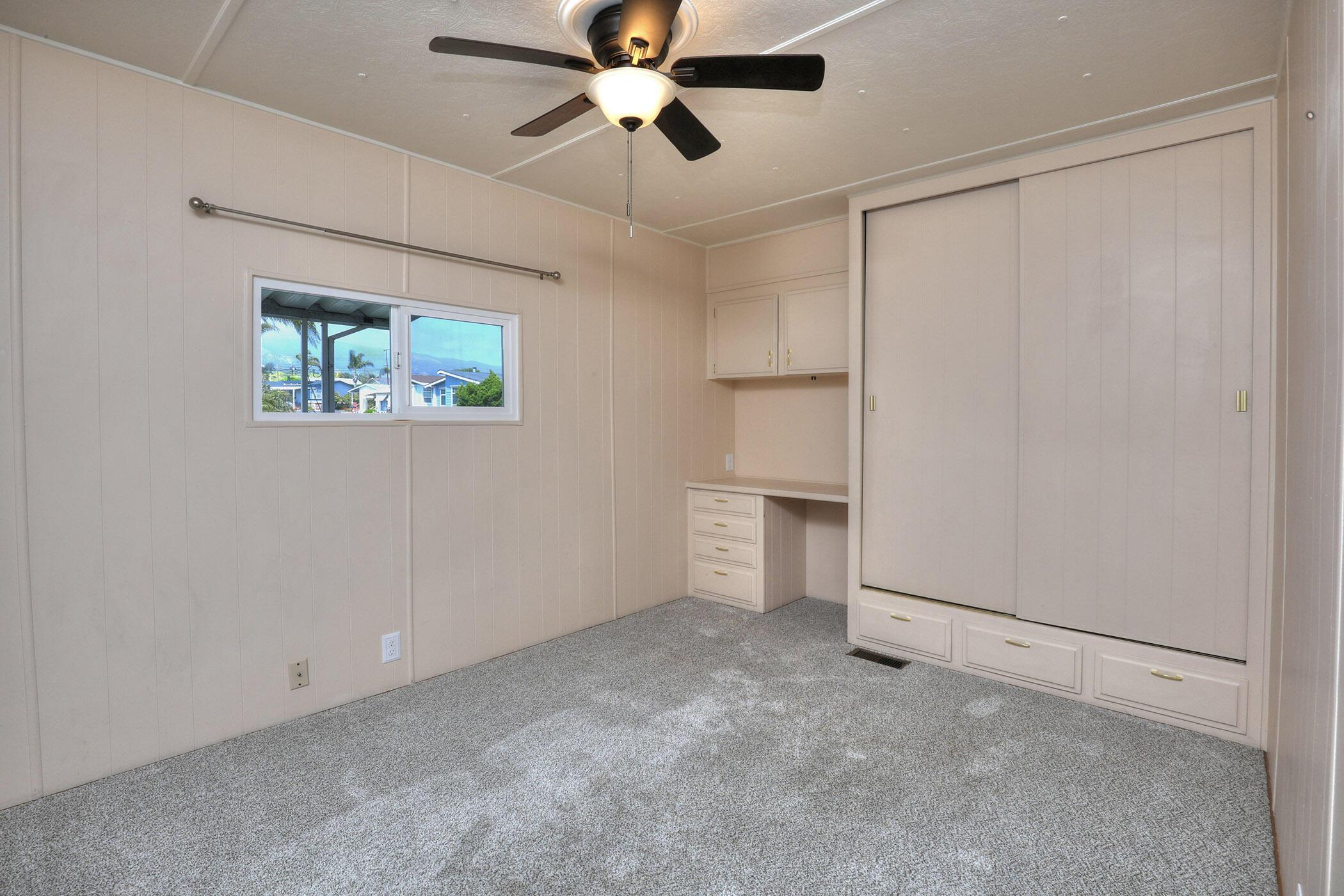 30 Winchester Canyon Road, Unit SPC 50 Goleta, CA 93117 - Photo 17 of 30 an empty room with closet and windows