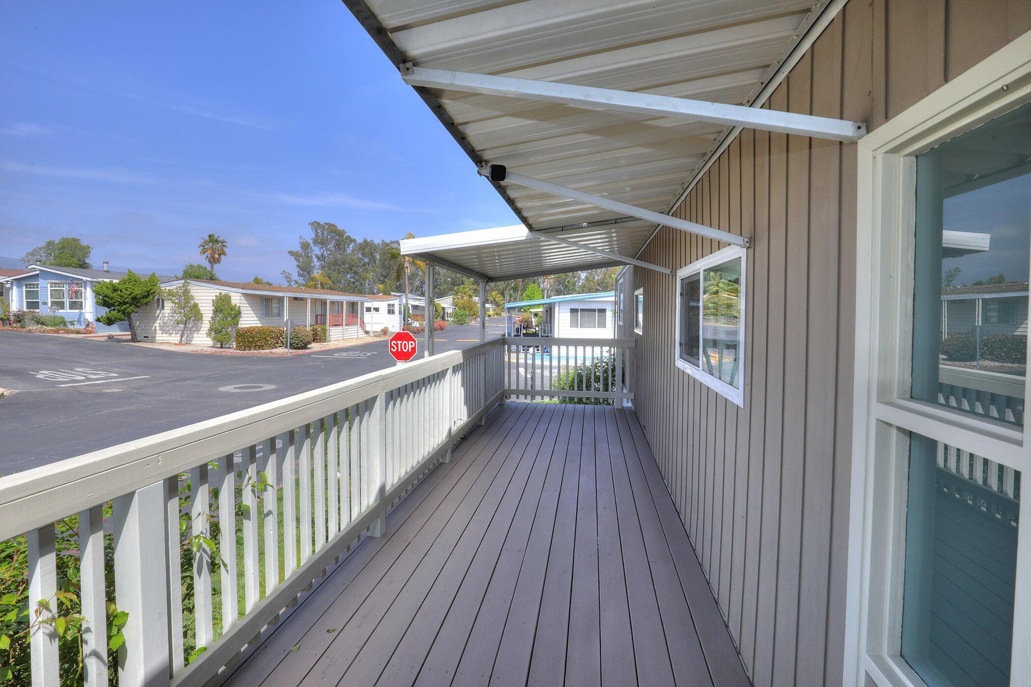 30 Winchester Canyon Road, Unit SPC 50 Goleta, CA 93117 - Photo 24 of 30 a view of a balcony with wooden floor