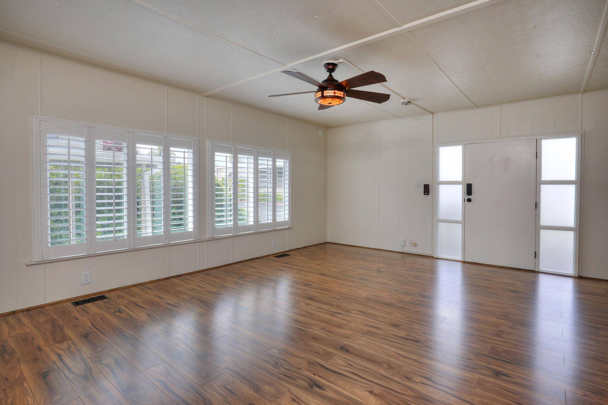 30 Winchester Canyon Road, Unit SPC 50 Goleta, CA 93117 - Photo 7 of 30 a view of an empty room with wooden floor and a window
