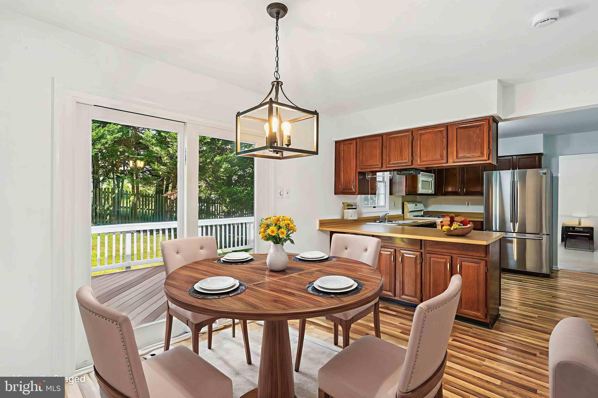 1944 Autumn Ridge Circle Silver Spring, MD 20906 - Photo 4 of 40 a view of a dining room with furniture window and outside view