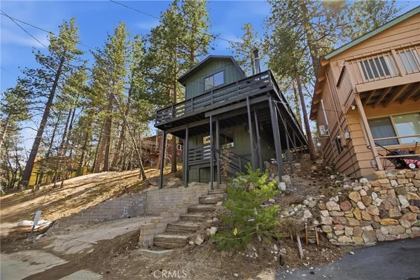 a view of a building with a tree