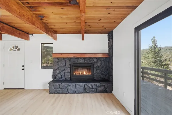 a living room with a fireplace