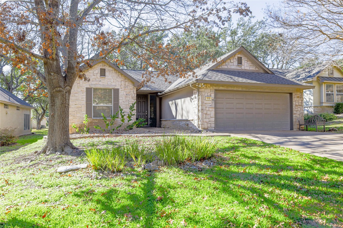 113 Nighthawk Way Georgetown, TX 78633 - Photo 1 of 1 a front view of a house with a yard