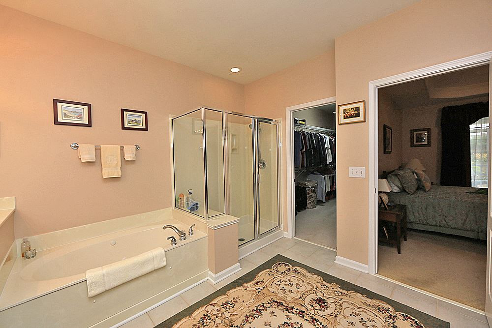 5333 Brandy Bay Road Raleigh, NC 27613 - Photo 11 of 20 Another view of the master bathroom that shows the walk in closet. Master Bathroom