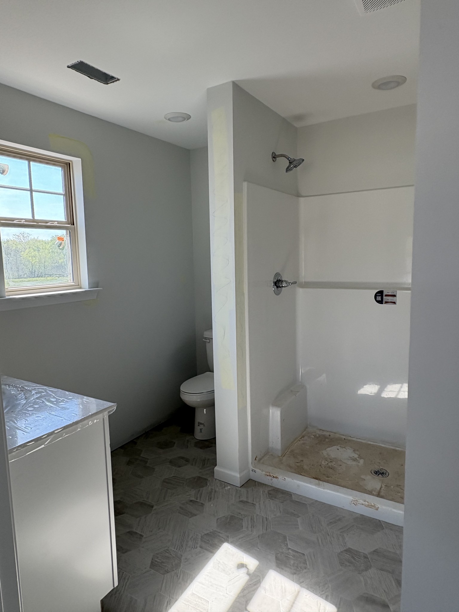 602 Ruby Cate Way Murfreesboro, TN 37128 - Photo 18 of 20 a bathroom with a shower and toilet