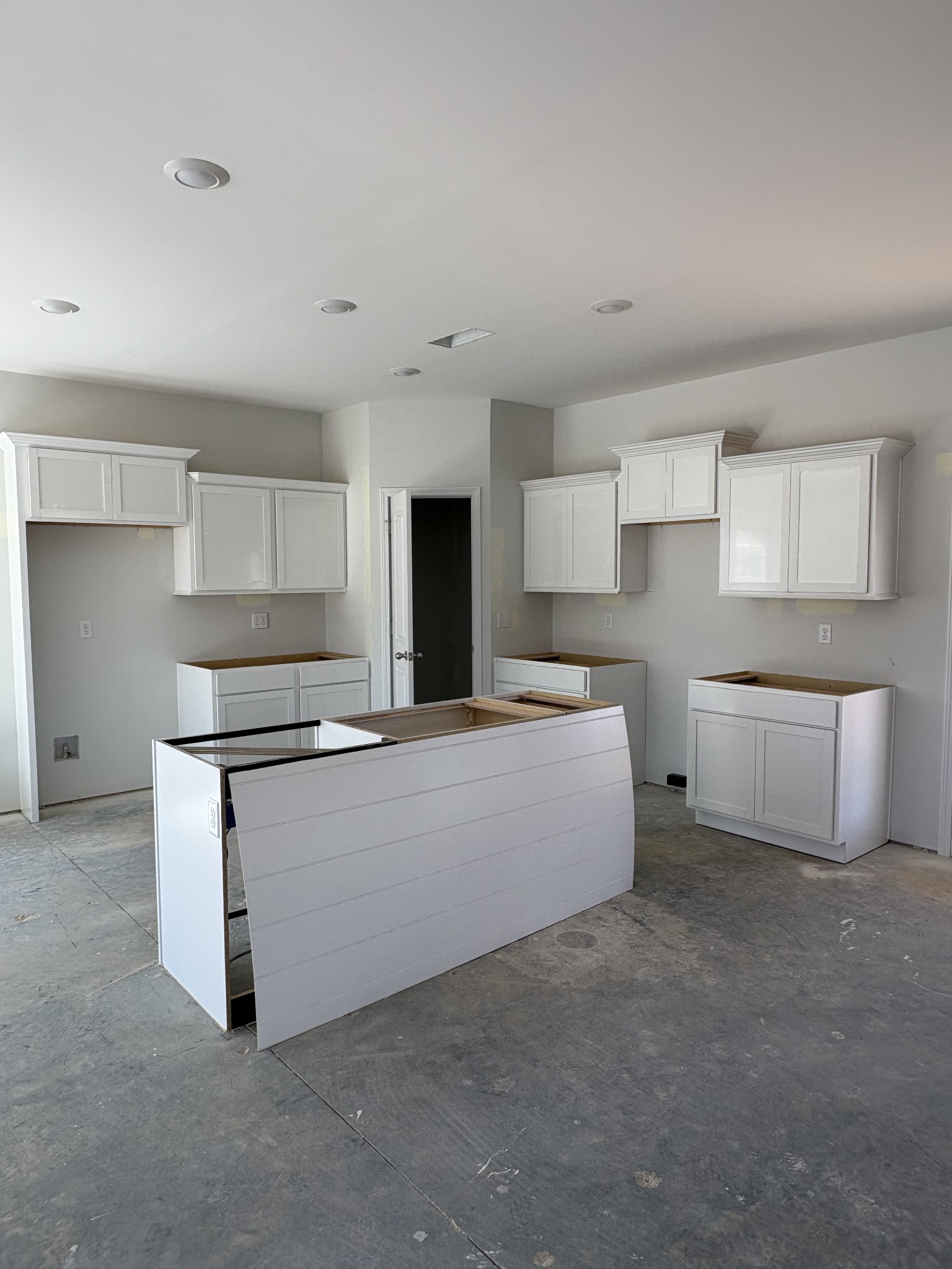 602 Ruby Cate Way Murfreesboro, TN 37128 - Photo 8 of 20 a living room with stainless steel appliances white cabinets and a couch