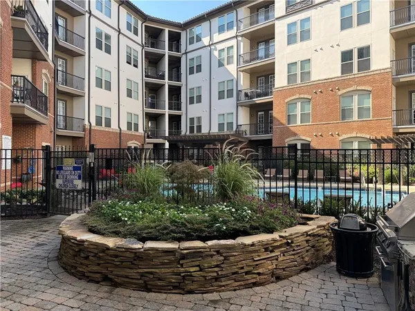 a view of a building with a garden