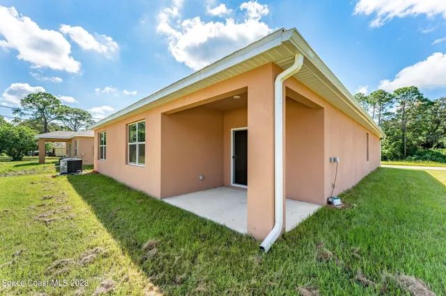 a view of outdoor space with a garden and entertaining space
