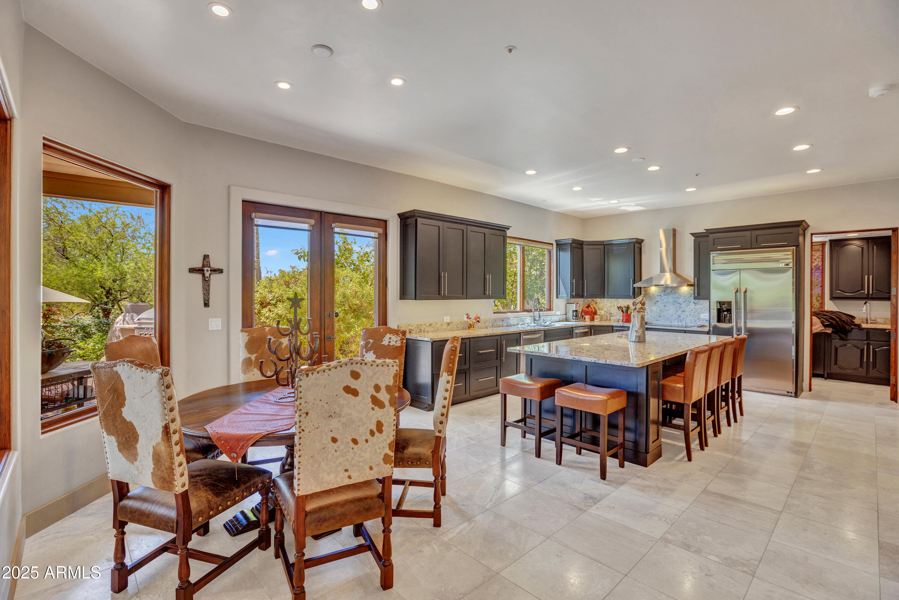 10040 East Happy Valley Road, Unit 268 Scottsdale, AZ 85255 - Photo 11 of 40 a view of a dining room with furniture window and outside view