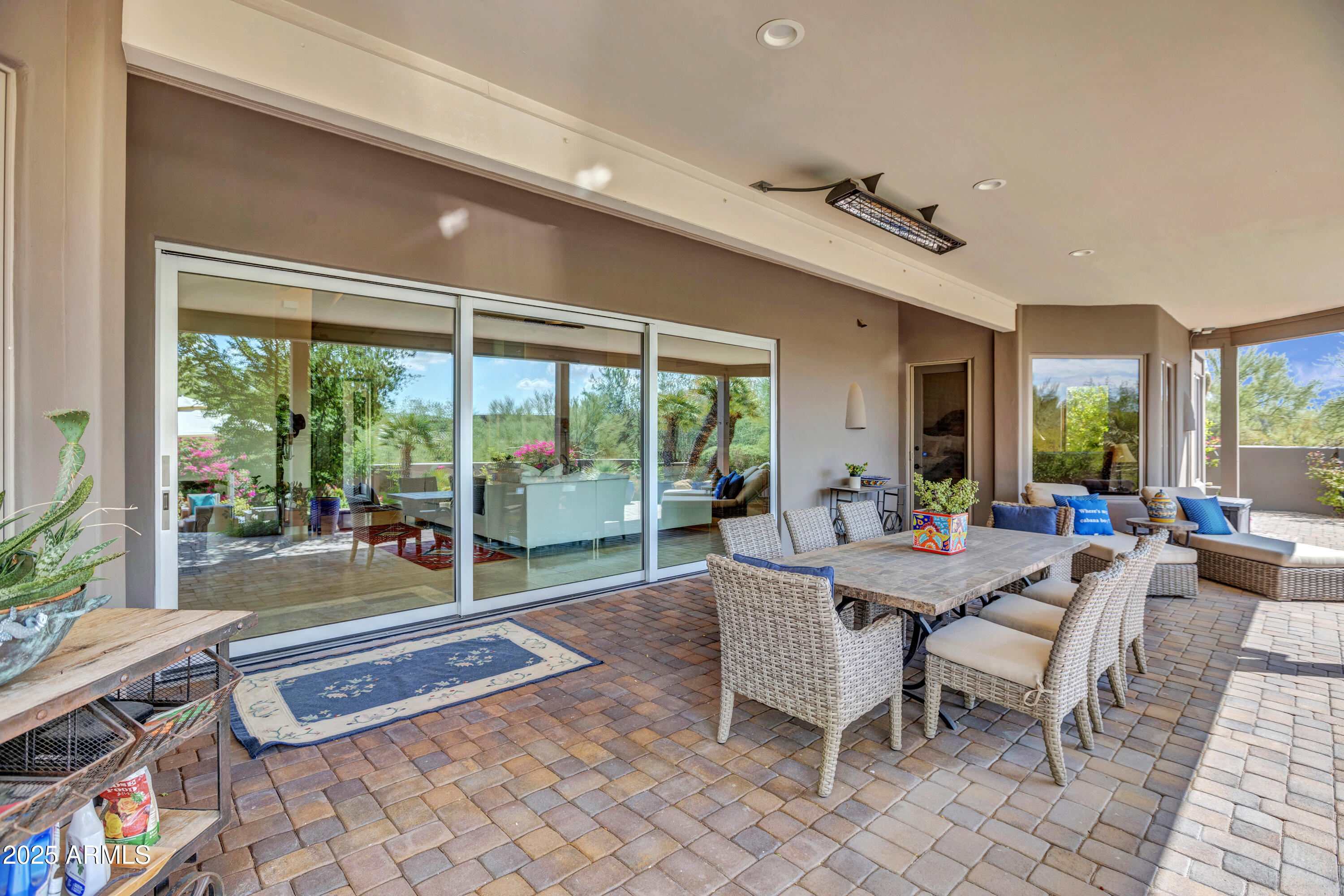10040 East Happy Valley Road, Unit 268 Scottsdale, AZ 85255 - Photo 31 of 40 a outdoor space with furniture and large windows