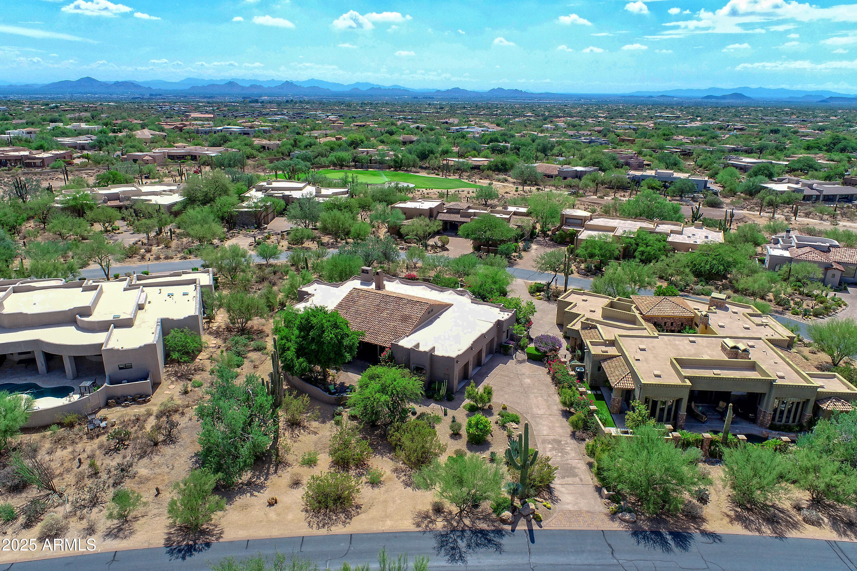 10040 East Happy Valley Road, Unit 268 Scottsdale, AZ 85255 - Photo 37 of 40 an aerial view of a city with lots of residential buildings
