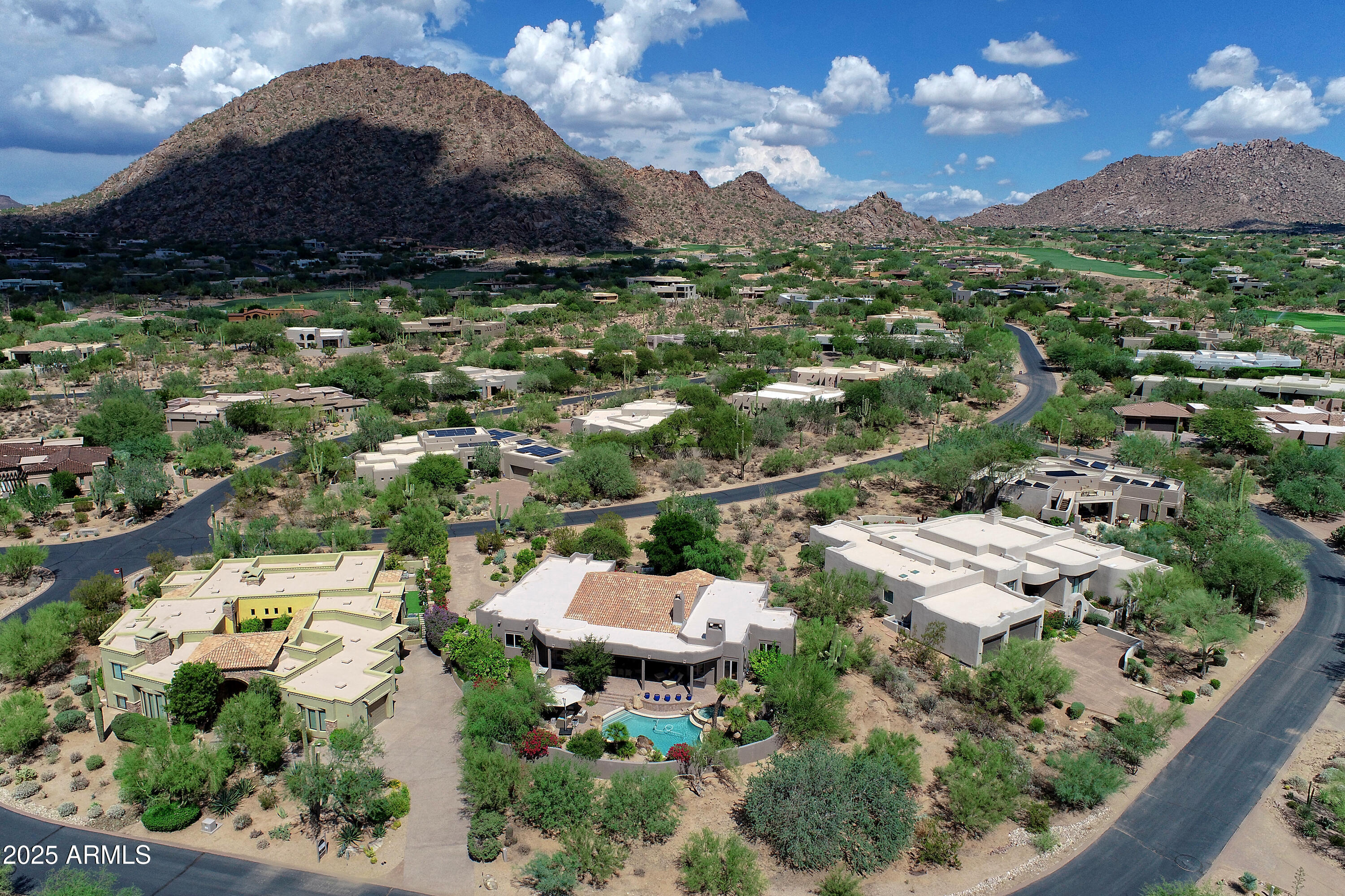 10040 East Happy Valley Road, Unit 268 Scottsdale, AZ 85255 - Photo 38 of 40 an aerial view of residential houses with outdoor space and trees