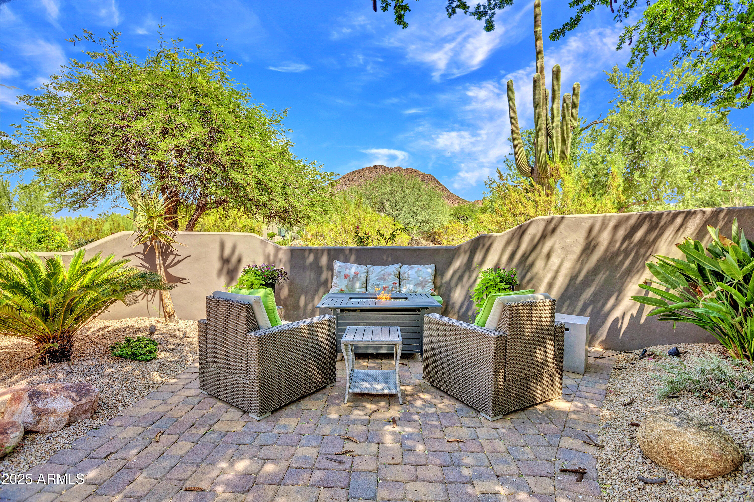 10040 East Happy Valley Road, Unit 268 Scottsdale, AZ 85255 - Photo 4 of 40 a view of an outdoor sitting area with a tree