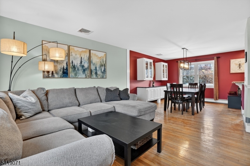 116 Star Lake Road Bloomingdale, NJ 07403 - Photo 22 of 24 a living room with furniture and a large window