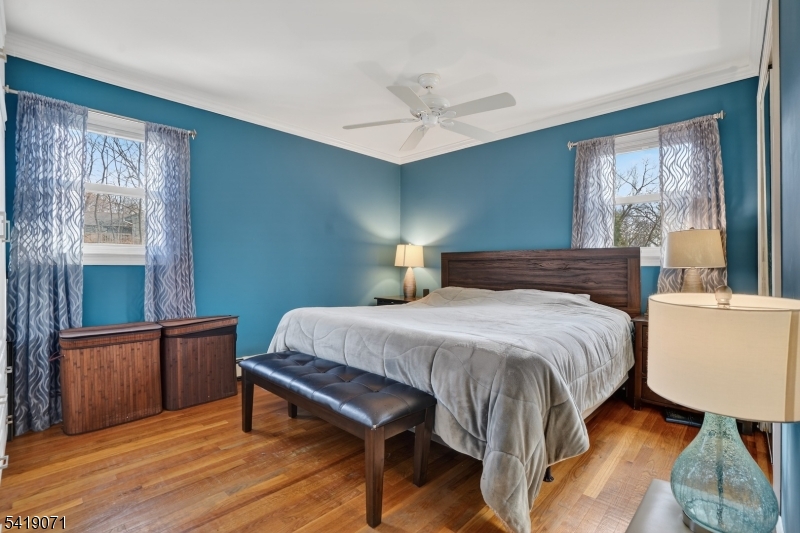116 Star Lake Road Bloomingdale, NJ 07403 - Photo 3 of 24 a bedroom with a bed and a large window