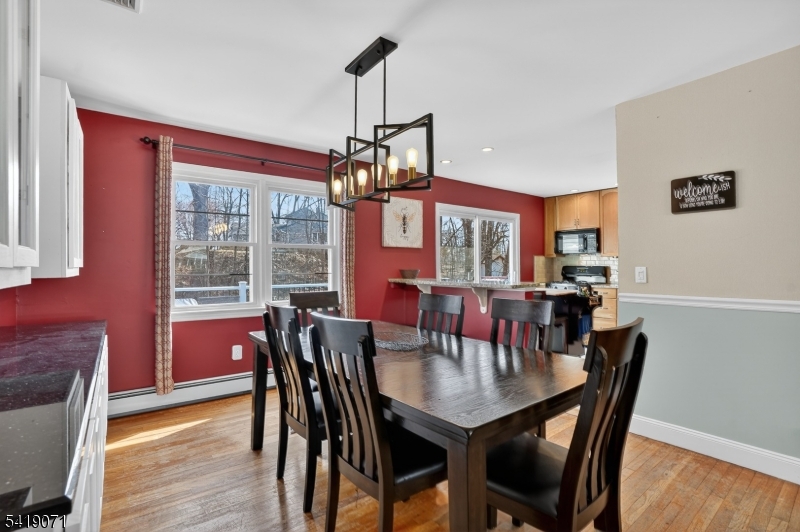 116 Star Lake Road Bloomingdale, NJ 07403 - Photo 10 of 24 a view of a dining room with furniture window and outside view