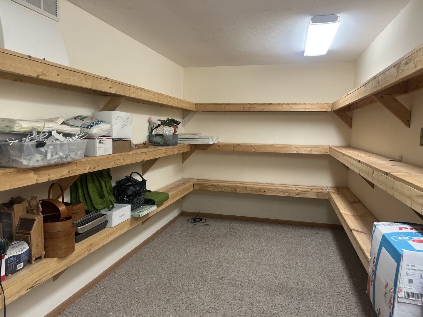 9843 Hoover Road Rock Falls, IL 61071 - Photo 11 of 23 a storage room with shelves