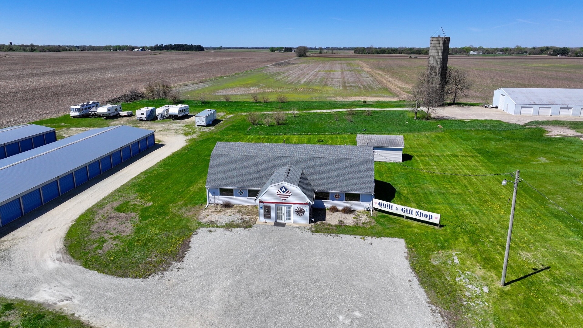 9843 Hoover Road Rock Falls, IL 61071 - Photo 20 of 23 a view of a house with a yard and lake view