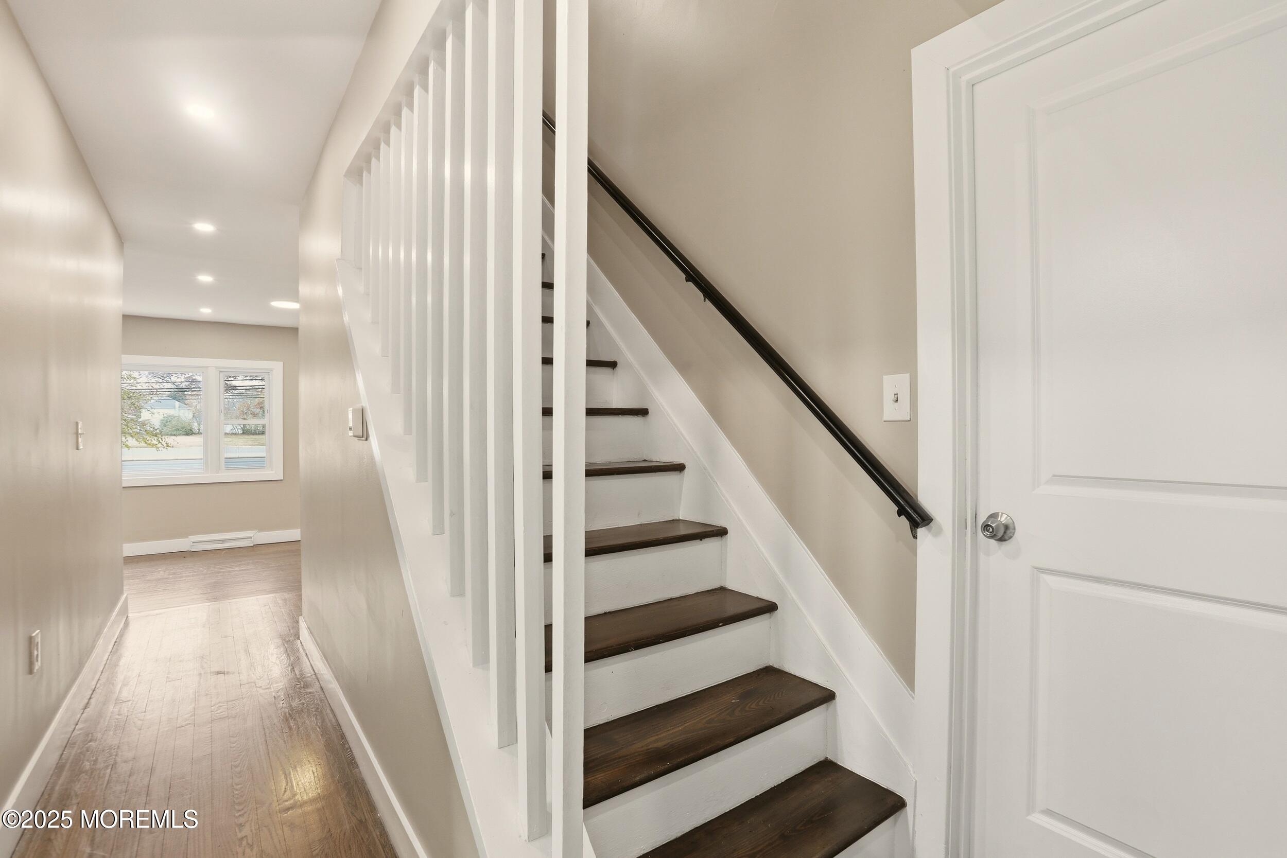 2930 Highway 9 Howell, NJ 07731 - Photo 11 of 30 a view of entryway with wooden floor and stairs