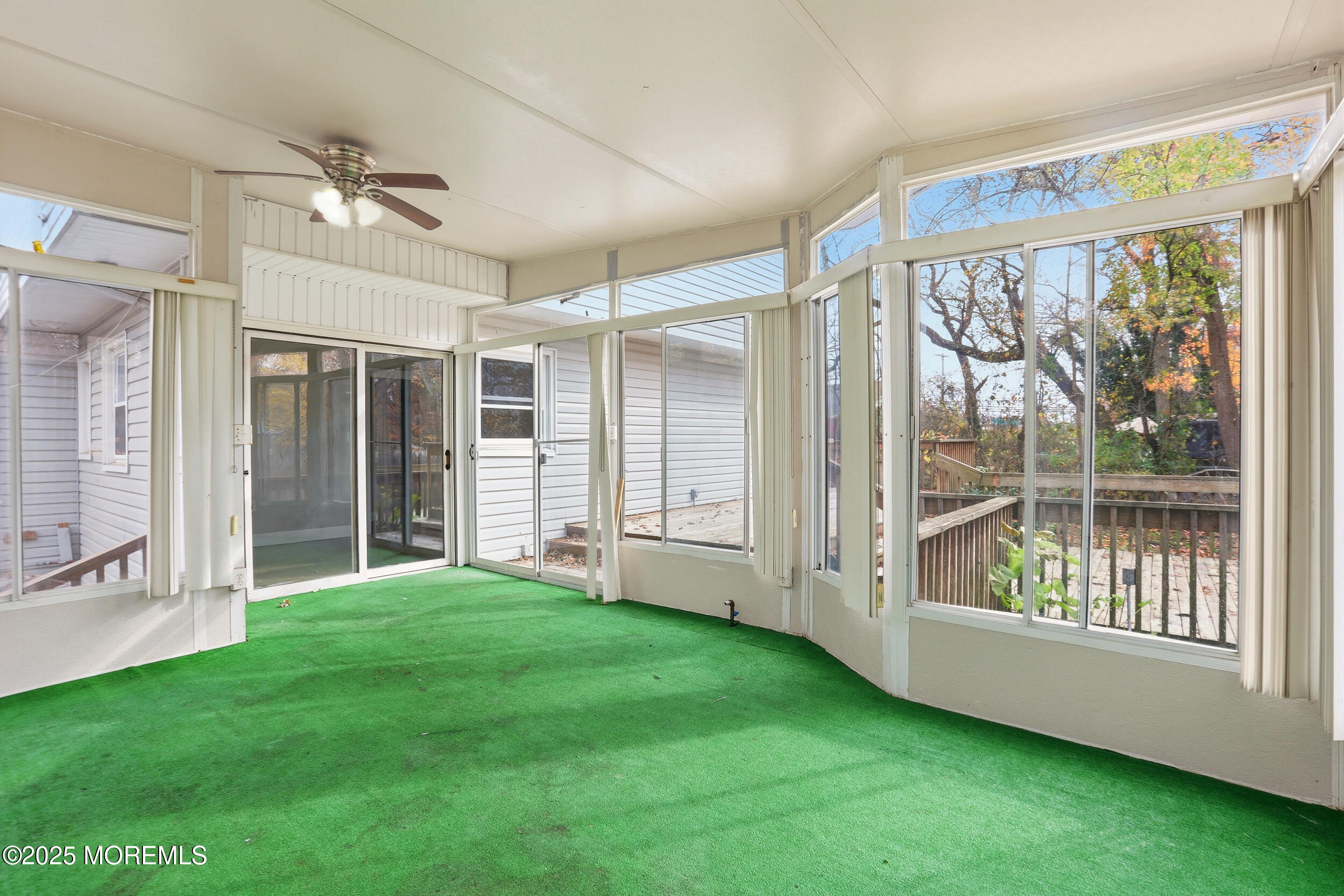 2930 Highway 9 Howell, NJ 07731 - Photo 24 of 30 a view of an empty room with a window and hardwood floor