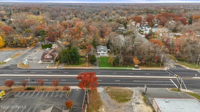 an aerial view of a houses with a outdoor space