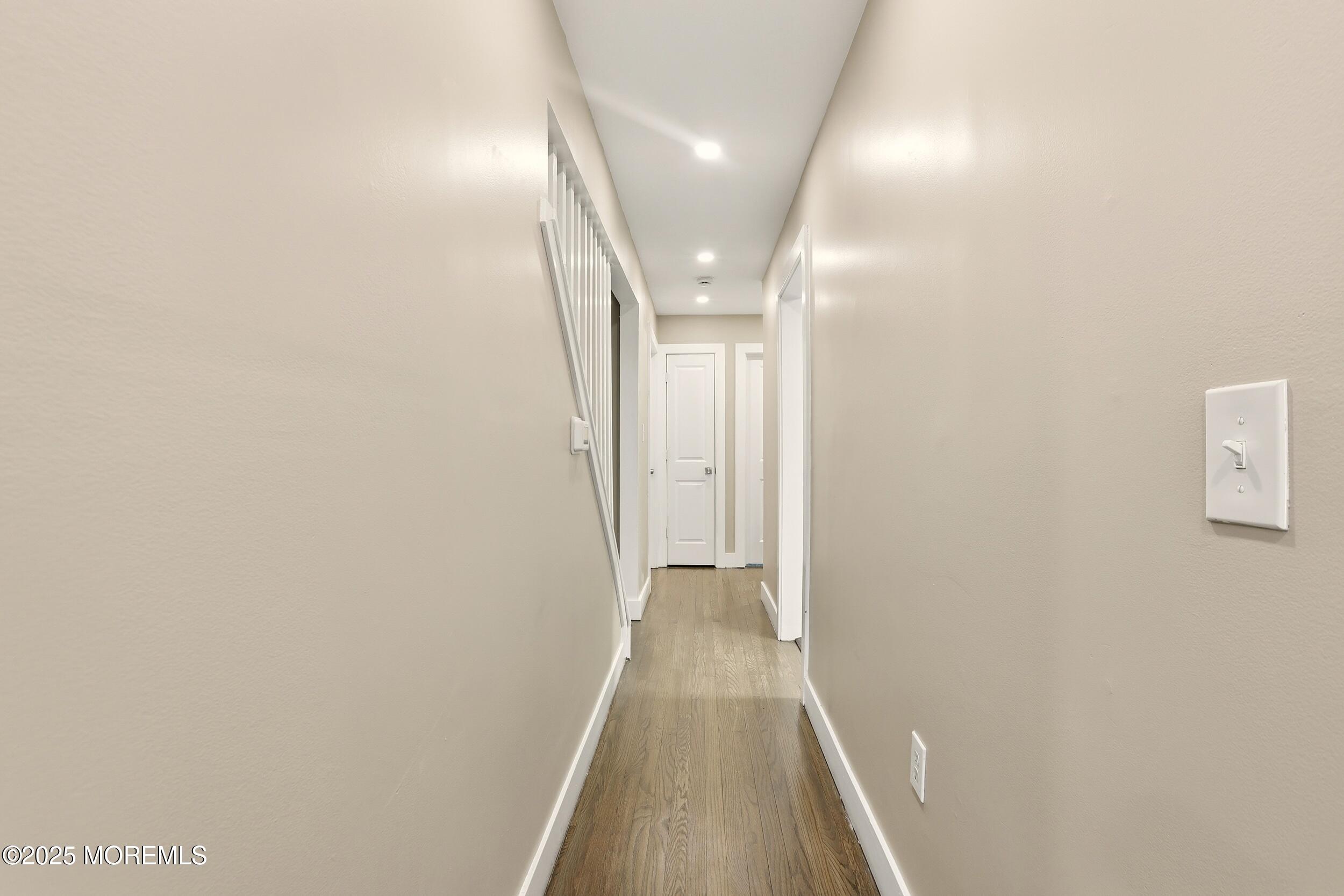 2930 Highway 9 Howell, NJ 07731 - Photo 10 of 30 a view of a hallway with wooden floor