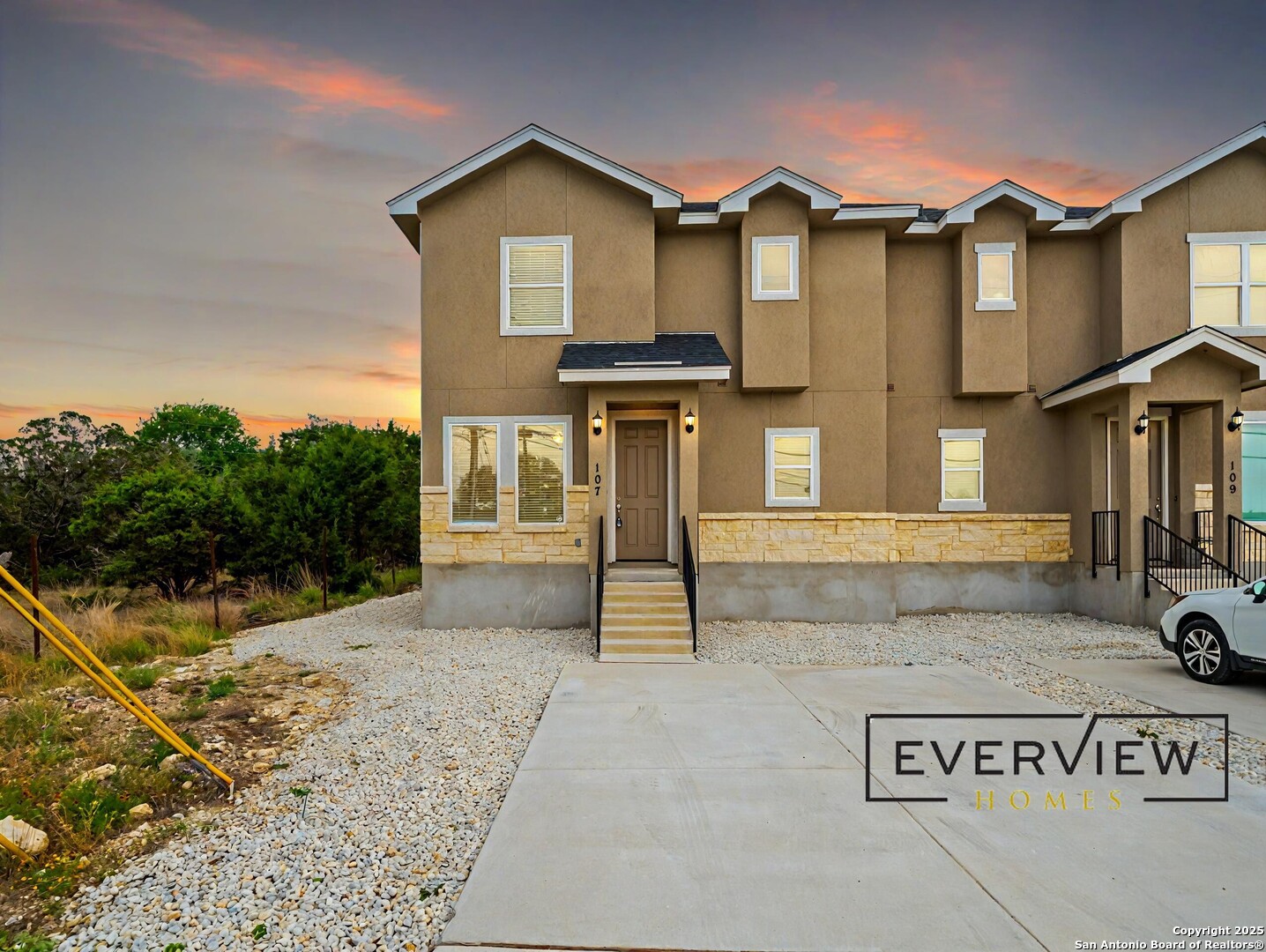 109 High Drive, Unit A Spring Branch, TX 78070 - Photo 1 of 24 a front view of a house with garden