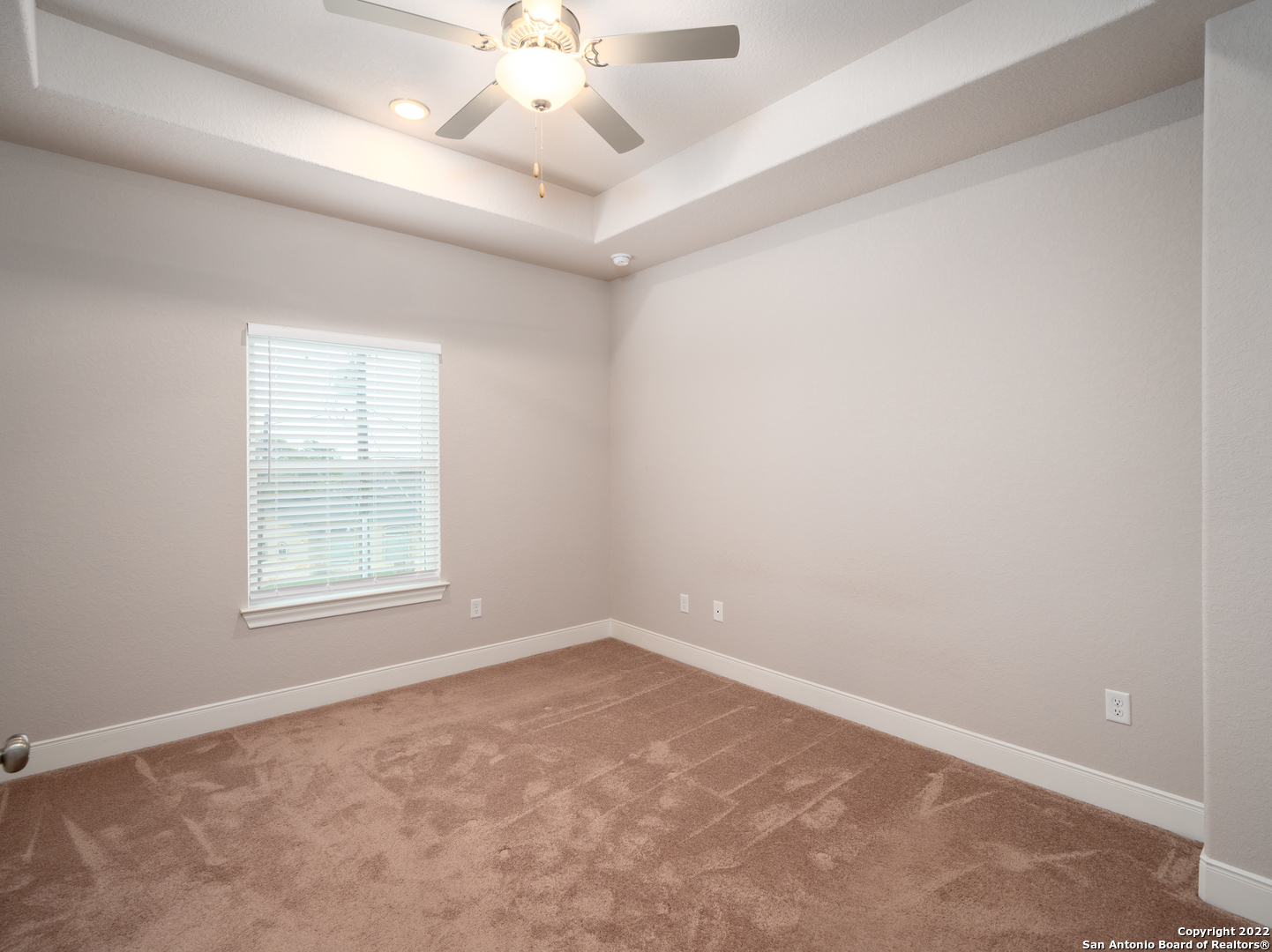 109 High Drive, Unit A Spring Branch, TX 78070 - Photo 20 of 24 an empty room with a window