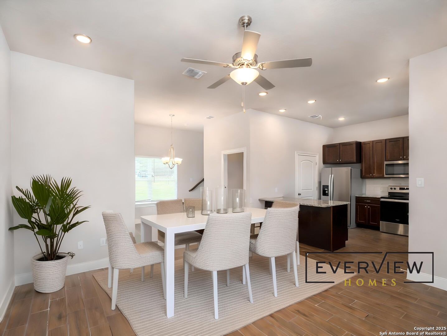 109 High Drive, Unit A Spring Branch, TX 78070 - Photo 4 of 24 a view of a dining room with furniture and wooden floor