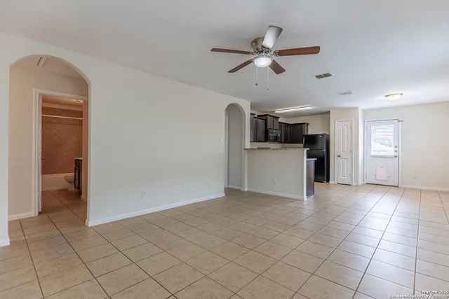 a view of a kitchen with a sink dishwasher and a refrigerator