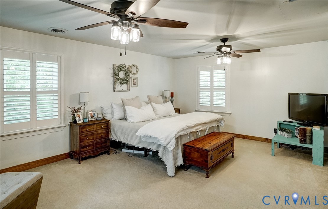1174 Dorset Road Powhatan, VA 23139 - Photo 22 of 38 Spacious master bedroom featuring two ceiling fans