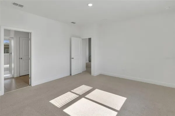 an empty room with an entryway