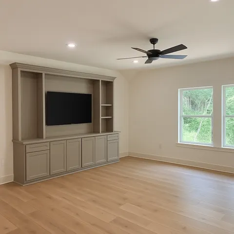a view of a kitchen with granite countertop cabinets and wooden floor