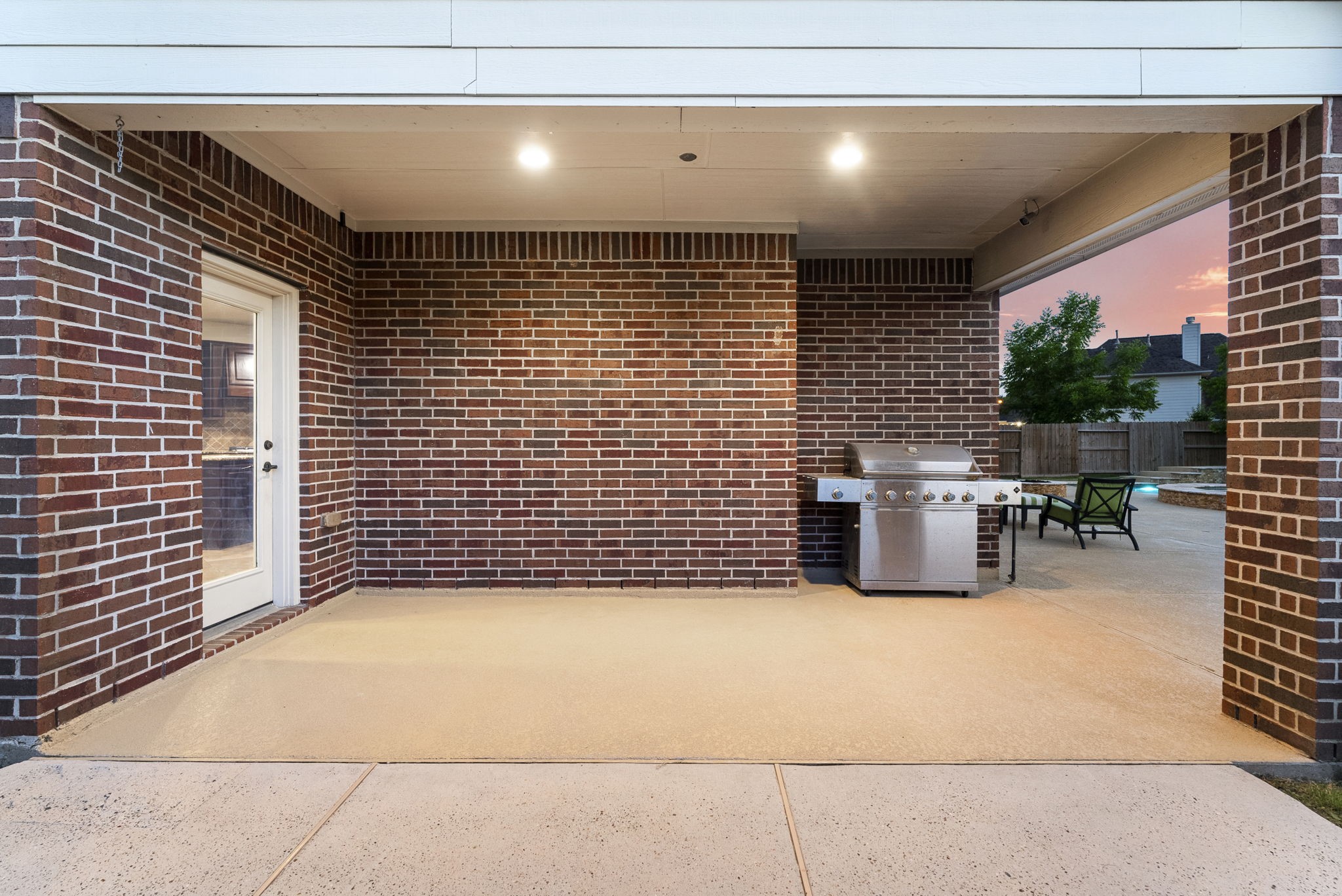 19223 Senterra Lakes Boulevard Spring, TX 77379 - Photo 39 of 48 a view of a patio with table and chairs