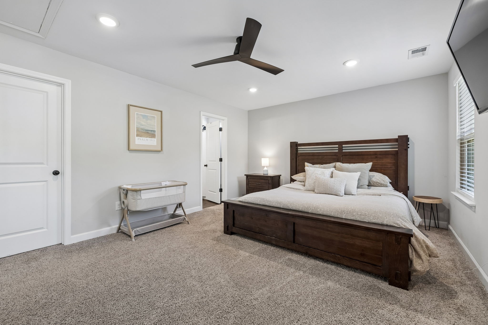 300 Still Point Road Smithville, TN 37166 - Photo 20 of 40 a bedroom with a bed a table and chair