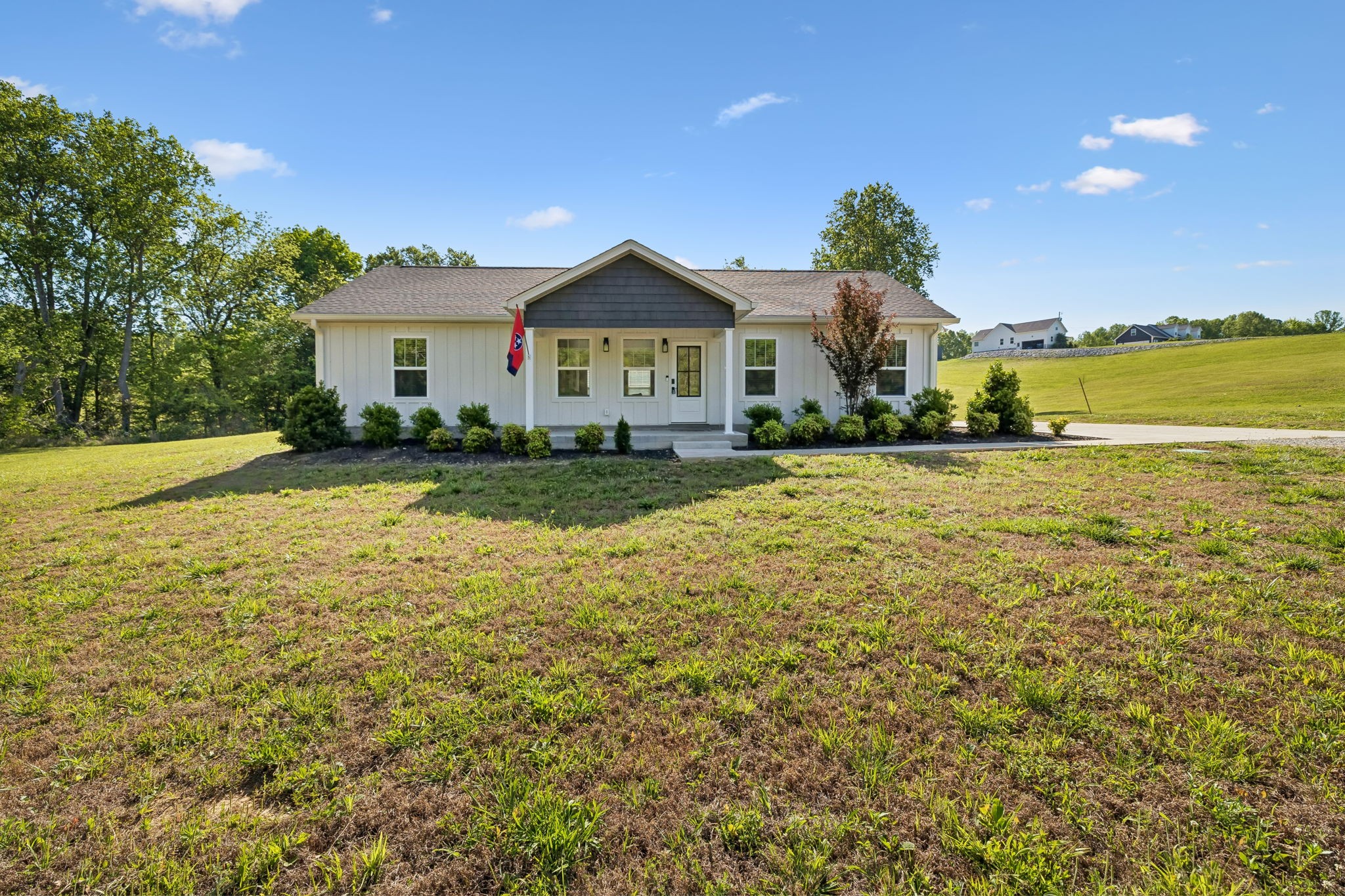 300 Still Point Road Smithville, TN 37166 - Photo 2 of 40 a view of a house with a yard and a large tree