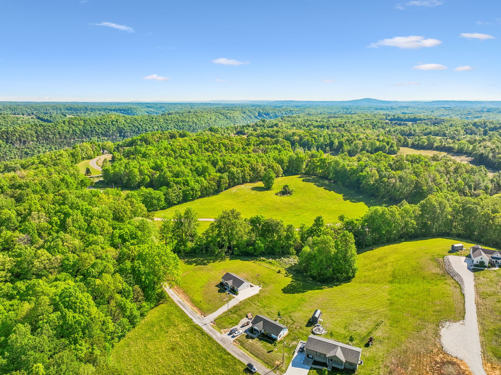 300 Still Point Road Smithville, TN 37166 - Photo 33 of 40 an aerial view of residential houses with outdoor space