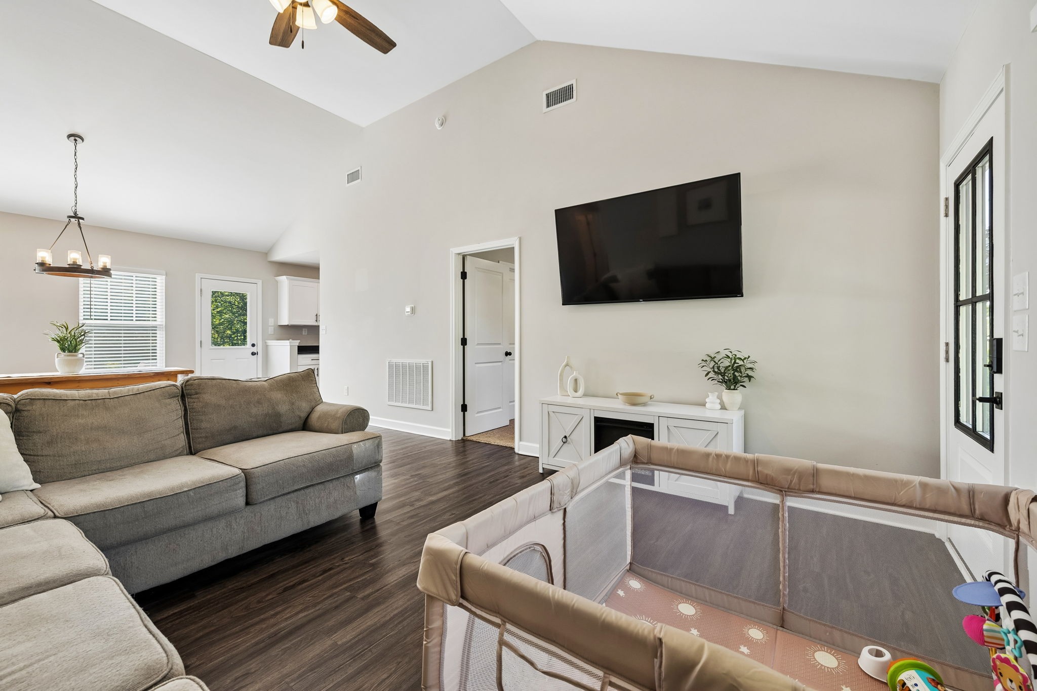 300 Still Point Road Smithville, TN 37166 - Photo 10 of 40 a living room with furniture and a flat screen tv