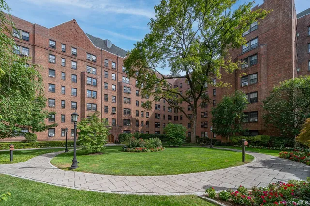 a view of a building with a yard