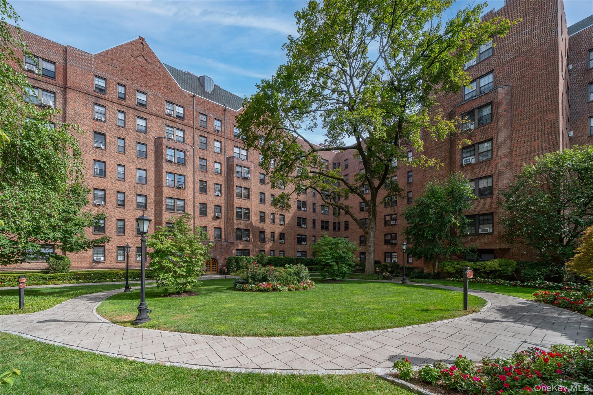 a view of a building with a yard