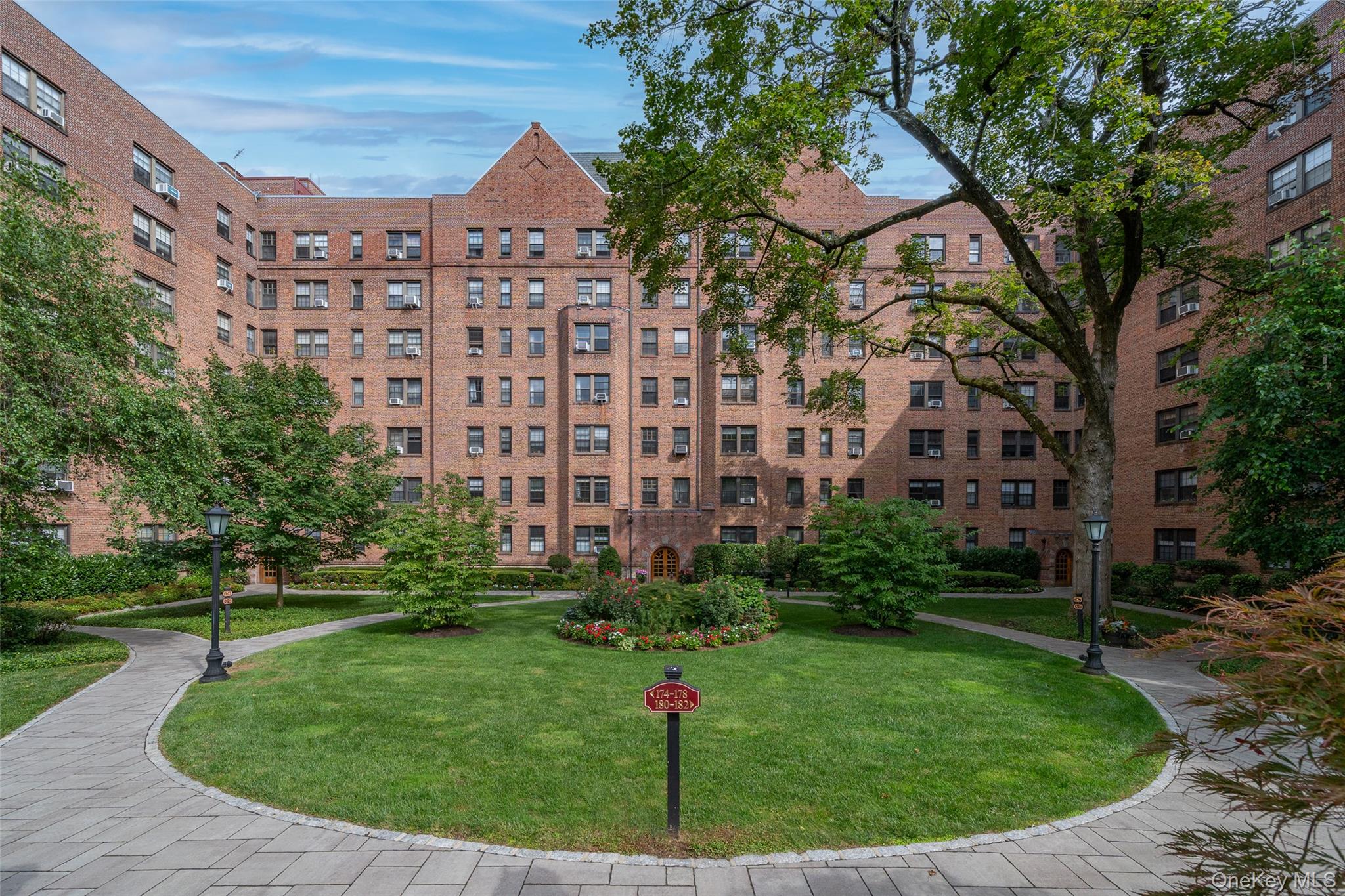 180 Garth Road, Unit 5F Scarsdale, NY 10583 - Photo 19 of 26 a aerial view of a building