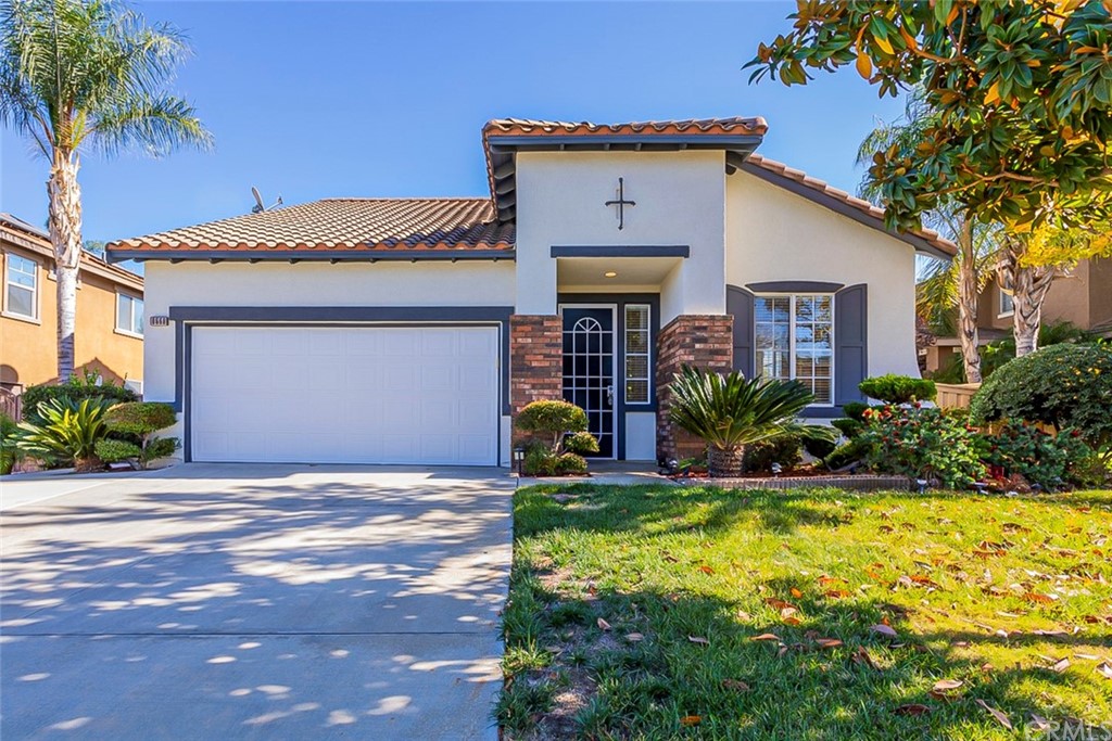 8668 Cabin Place Riverside, CA 92508 - Photo 1 of 1 a front view of a house with a yard