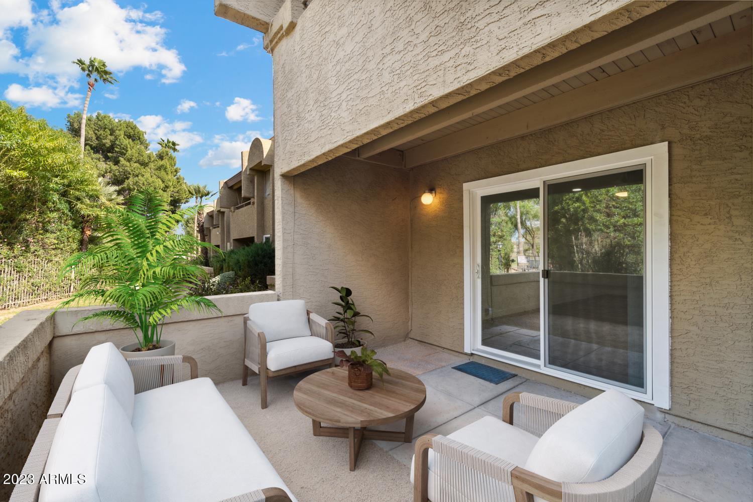 4050 East Cactus Road, Unit 104 Phoenix, AZ 85032 - Photo 1 of 29 Back patio by Pool and Greenbelt