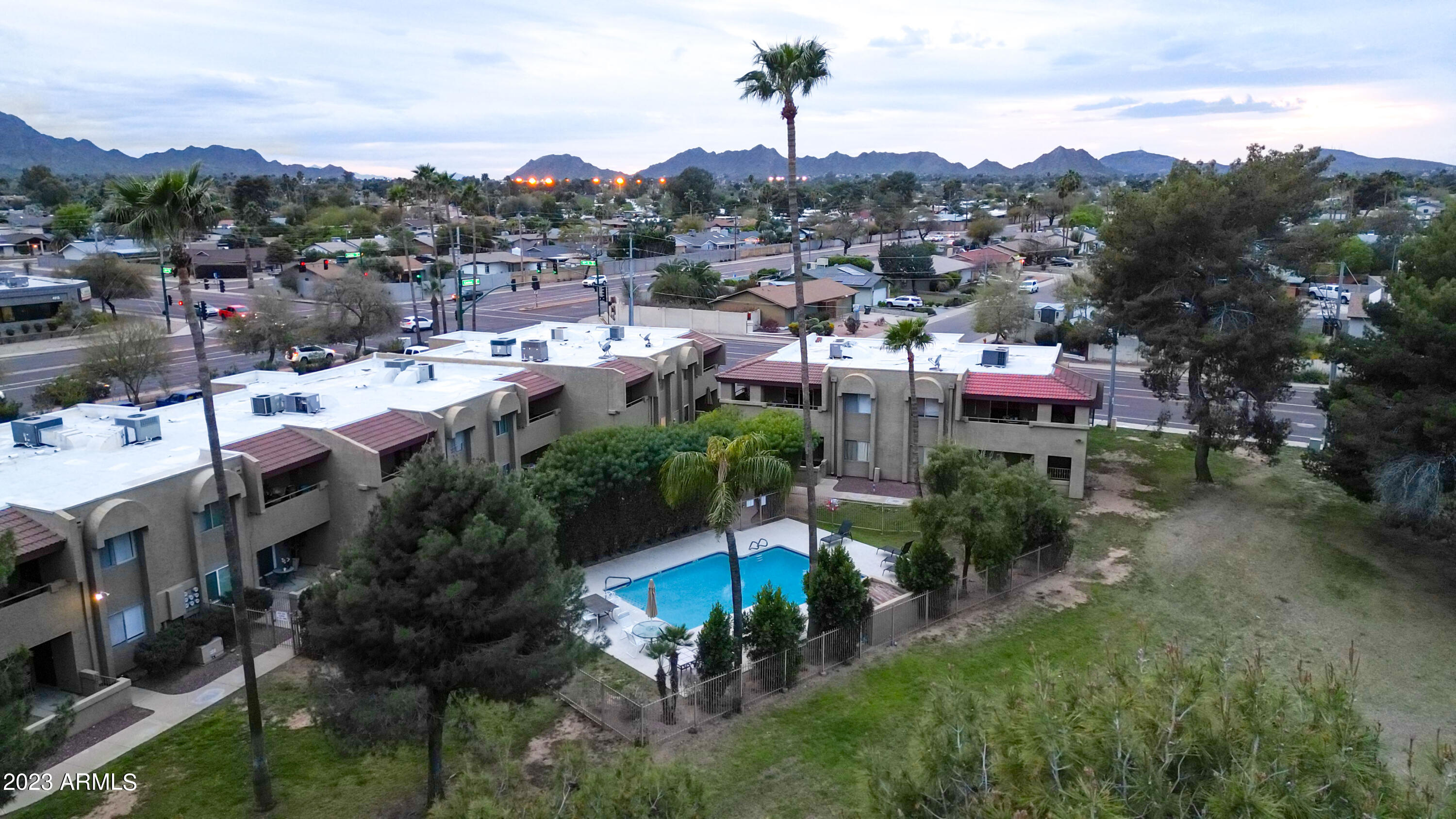 4050 East Cactus Road, Unit 104 Phoenix, AZ 85032 - Photo 19 of 29 Pool + Greenbelt