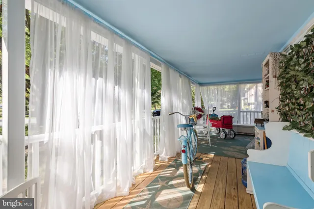 a view of a backyard with a tree