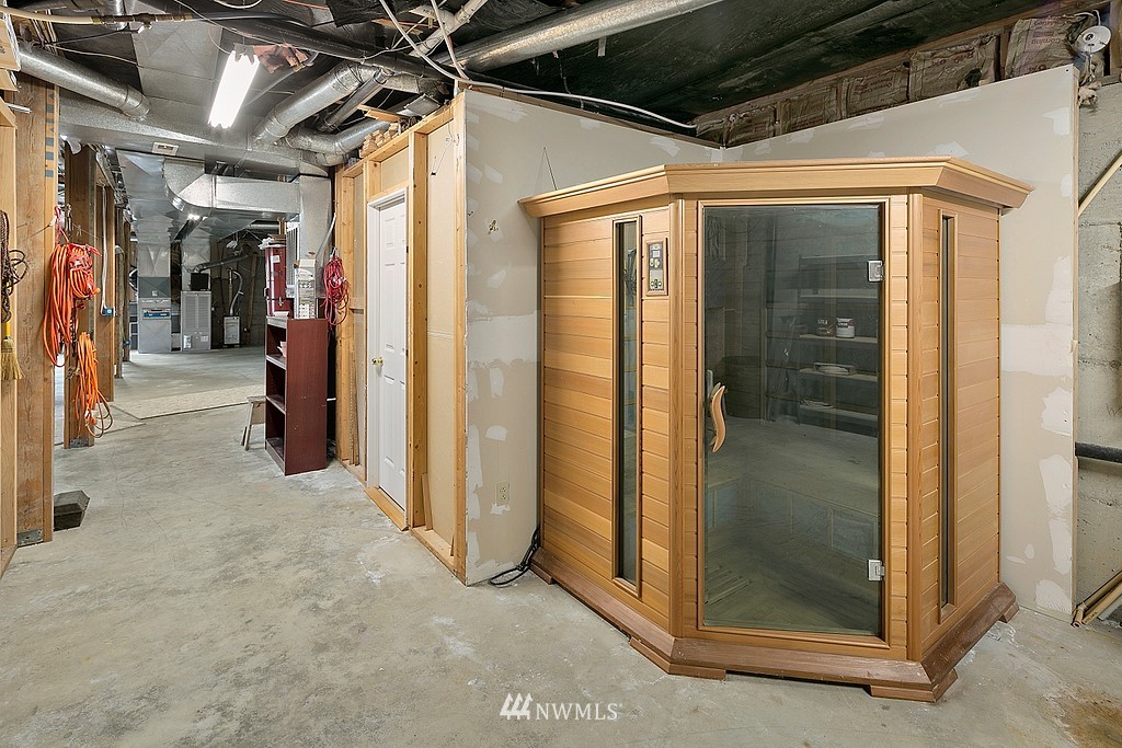 2075 East Goss Lake Road Freeland, WA 98249 - Photo 25 of 40 a view of a hallway with a glass door