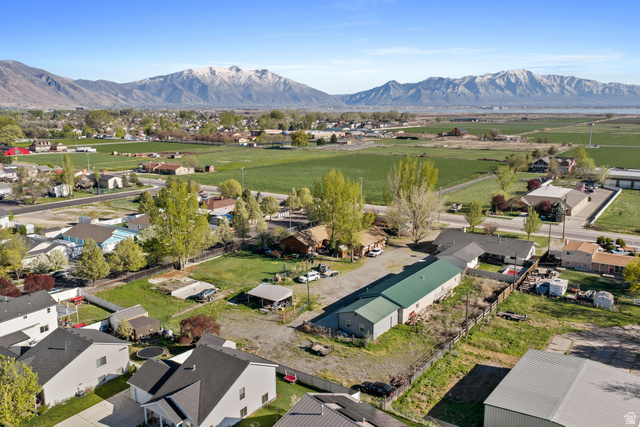 49 North 2830th West, Unit 3 Provo, UT 84601 - Photo 6 of 13 Aerial view of residential area with a mountain backdrop