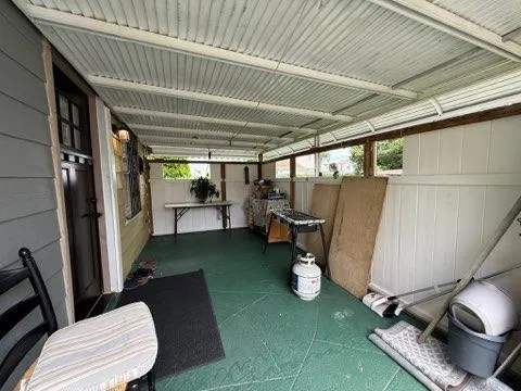 a view of a livingroom with furniture and a couch
