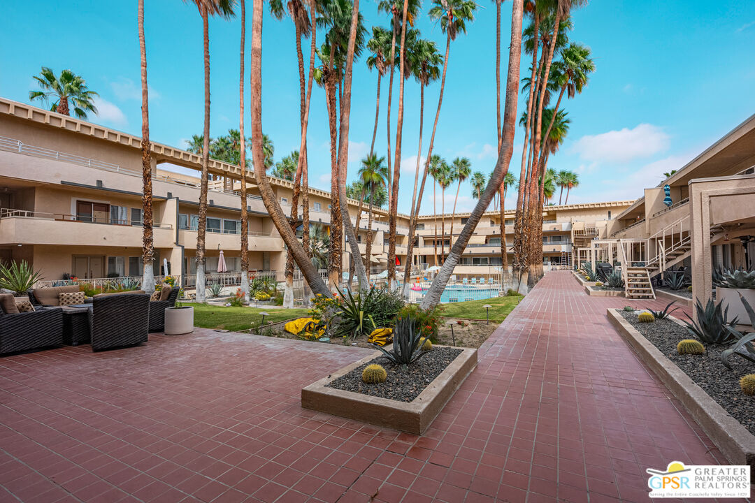 277 East Alejo Road, Unit 124 Palm Springs, CA 92262 - Photo 23 of 25 a view of a city with tall buildings