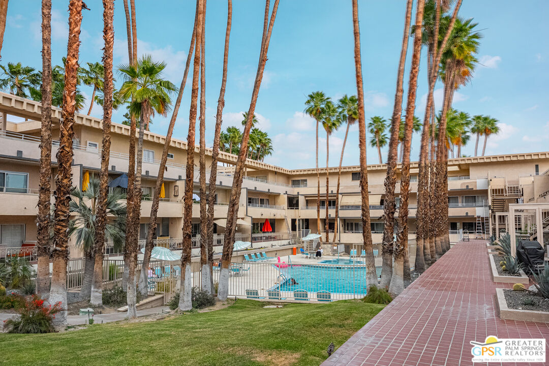277 East Alejo Road, Unit 124 Palm Springs, CA 92262 - Photo 25 of 25 a view of building with yard
